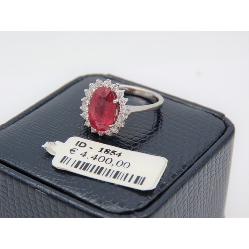 200 - Ruby Centre Stone Ladies Ring with Diamond Cluster Setting Mounted on 18 Carat White Gold Band Ruby ... 