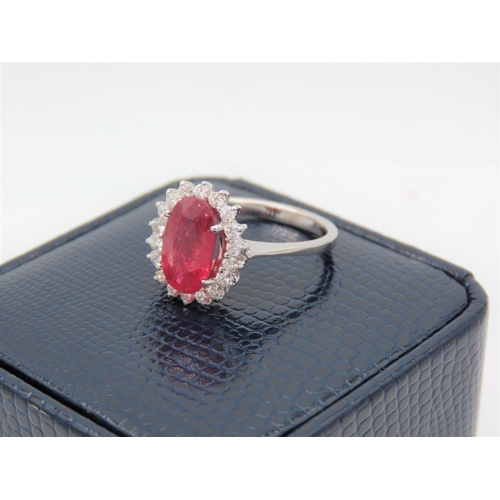 200 - Ruby Centre Stone Ladies Ring with Diamond Cluster Setting Mounted on 18 Carat White Gold Band Ruby ... 