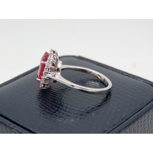 200 - Ruby Centre Stone Ladies Ring with Diamond Cluster Setting Mounted on 18 Carat White Gold Band Ruby ... 