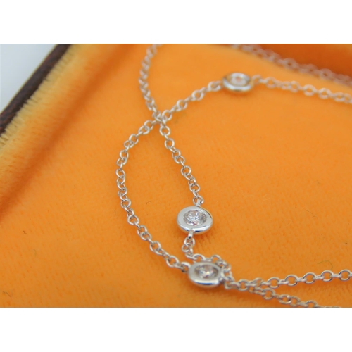 217 - 18 Carat White Gold Tiffany Design Diamond Set Ladies Necklace 60cm Long Approximately