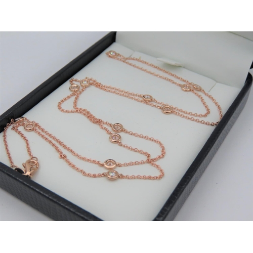 218 - 18 Carat Pink Gold Tiffany Design Diamond Set Ladies Necklace 60cm Long Approximately