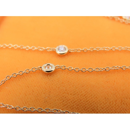 219 - 18 Carat Yellow Gold Tiffany Design Diamond Set Ladies Necklace 60cm Long Approximately