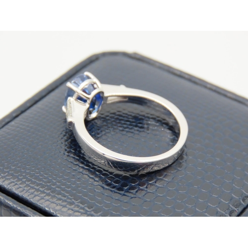 241 - Ladies Solitaire Sapphire Ring with Baguette Cut Diamond Shoulders Mounted on 18 Carat White Gold Ba... 