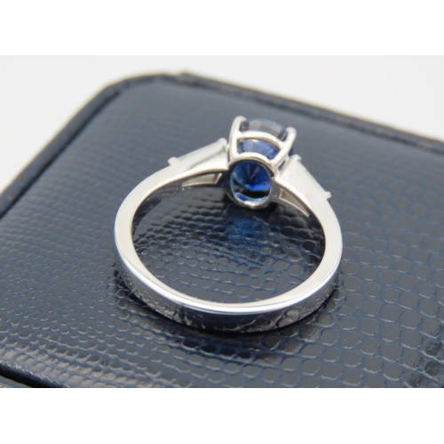 241 - Ladies Solitaire Sapphire Ring with Baguette Cut Diamond Shoulders Mounted on 18 Carat White Gold Ba... 