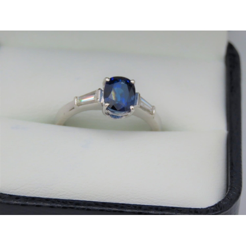 241 - Ladies Solitaire Sapphire Ring with Baguette Cut Diamond Shoulders Mounted on 18 Carat White Gold Ba... 