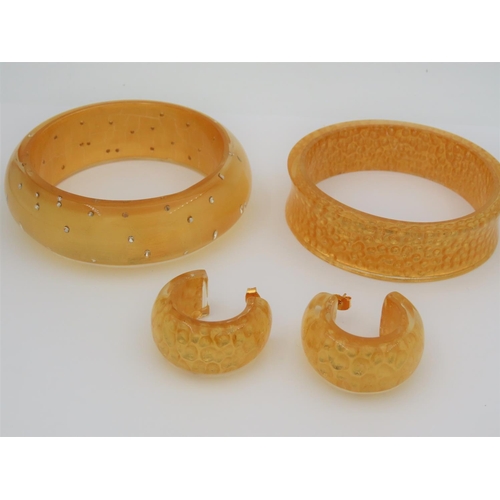 243 - Two Ladies Modernist Form Bangles with 24 Carat Gold Highlights and Pair of Earrings