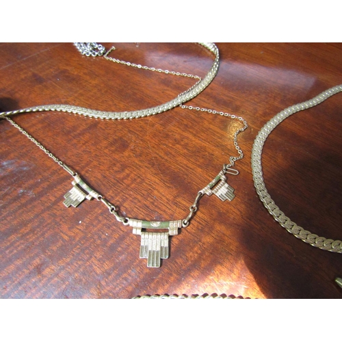 250 - Five Various Vintage Ladies Necklaces including Gold Filled Examples
Please Note: The Next 27 Lots C... 