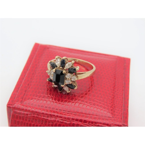 27 - Sapphire and Diamond Ladies Cluster Ring Mounted on 9 Carat Gold Band Ring Size R