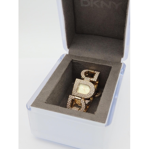 33 - DKNY Ladies Designer Wristwatch Interlinking Form Contained within Presentation Box