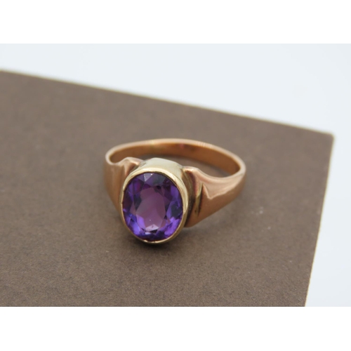 391 - Amethyst Oval Cut Ladies Centre Stone Ring Mounted on 9 Carat Yellow Gold Band Ring Size N and a Hal... 