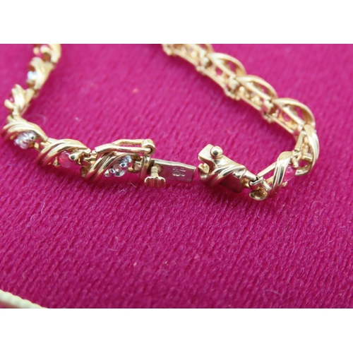 392 - Ruby and Diamond Ladies Bracelet Articulated Form Mounted on 9 Carat Yellow Gold