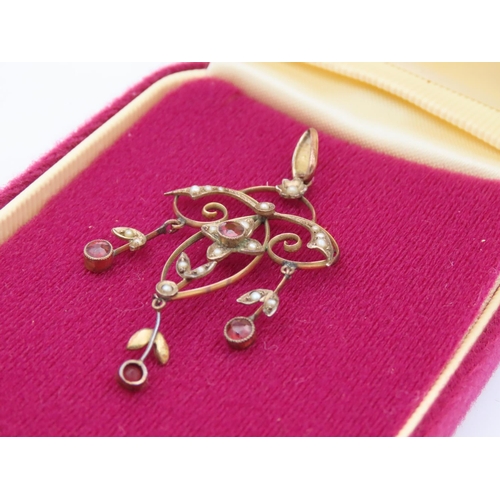 401 - 9 Carat Gold Garnet and Seed Pearl Set Edwardian Pendant Measures Approximately 5cm Drop x 2.5cm Wid... 