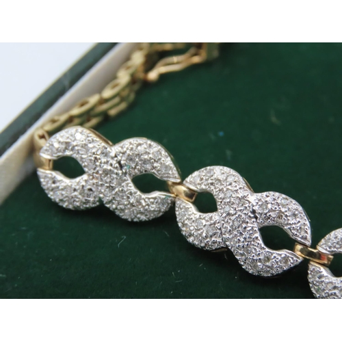 404 - Diamond Ladies Bracelet Articulated Form Mounted on 9 Carat Yellow Gold 19cm Long