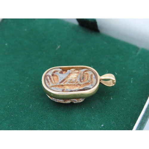 425 - 22 Carat Gold Pendant with Centre Decoration Stamped 750 Approximately Overall Length 2cm