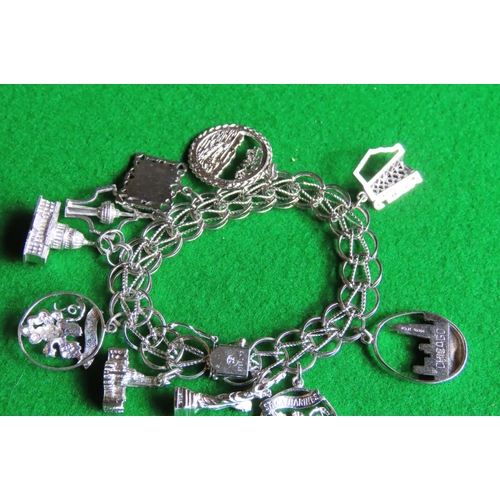 460 - Silver Ladies Charm Bracelet with Various Charms