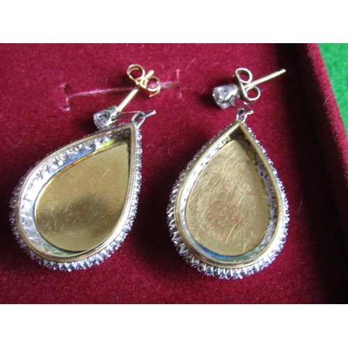 488 - Pair of 18 Carat  Gold Drop Earrings Each Set with a Single Diamond Below which is a Knife Edge Bar ... 