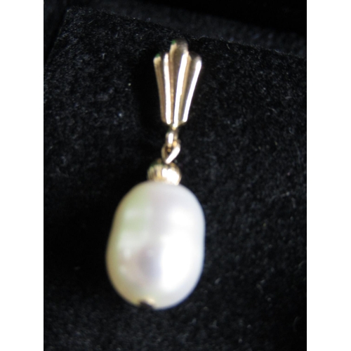 489 - Pair of 14 Carat Yellow Gold Set Pearl Earrings