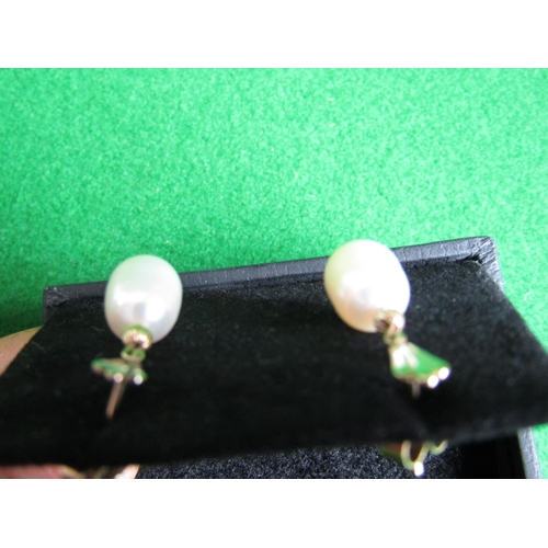 489 - Pair of 14 Carat Yellow Gold Set Pearl Earrings