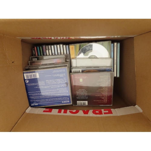 1200 - Large Box of VHS Tapes Mostly Star Trek Voyager Together with Quantity of CDs