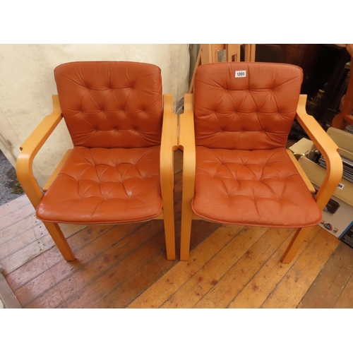 1205 - Pair of Mid Century Style Curved Form Leather Upholstered Armchairs Each Approximately 32 Inches Tal... 