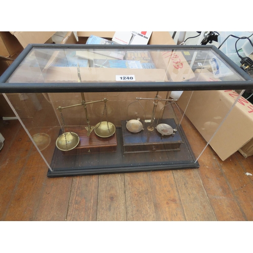 1240 - Two Sets of Balance Scales Contained in Acrylic Display Case Measuring Approximately 23 Inches Wide ... 