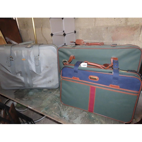 1257 - Three Vintage Suitcases Largest Approximately 32 Inches Wide