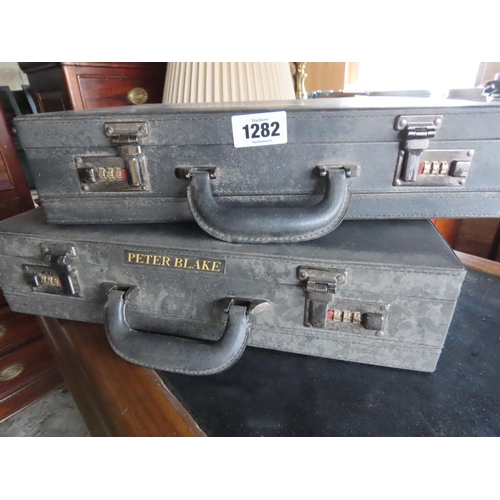 1282 - Two Combination Brief Cases One Bearing Peter Blake Label