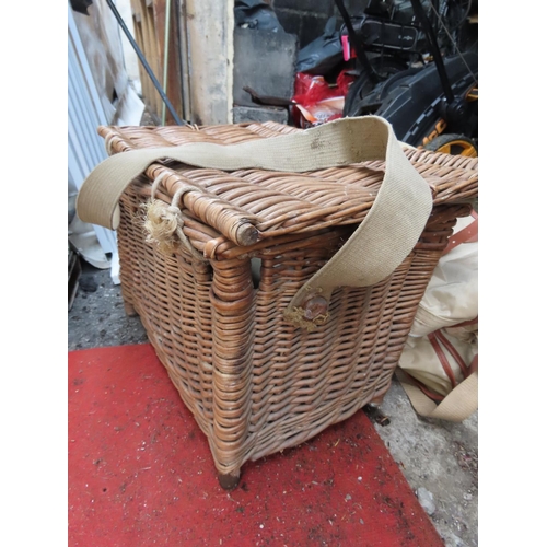 1301 - Wicker Basket Containing a Quantity of Fishing Items To Include Fishing Bag, Reels, Hooks etc. As Ph... 