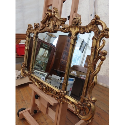 175 - Gilt Framed Three Panel Mirror Profusely Decorated 32 Inches x 26 Inches