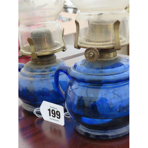 199 - Pair of Antique Blue Glass Paraffin Lamps with Integral Carrying Handle Tallest Approximately 12 Inc... 