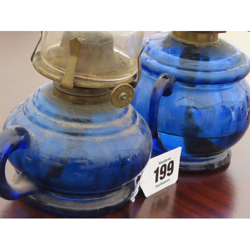 199 - Pair of Antique Blue Glass Paraffin Lamps with Integral Carrying Handle Tallest Approximately 12 Inc... 