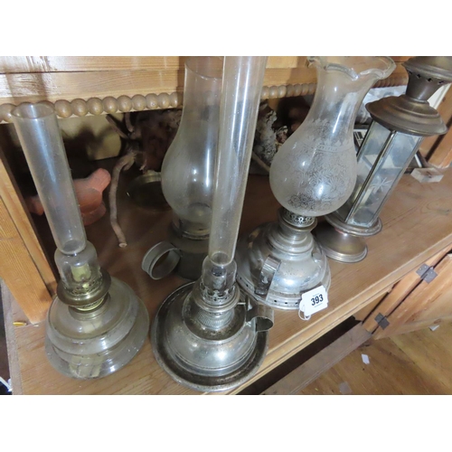 393 - Collection of Five Antique Oil and Kerosene Lamps and Candle Holder Tallest Approximately 15 Inches ... 