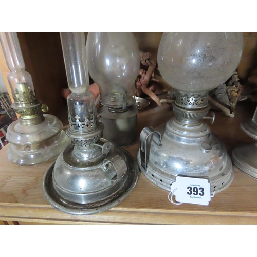 393 - Collection of Five Antique Oil and Kerosene Lamps and Candle Holder Tallest Approximately 15 Inches ... 