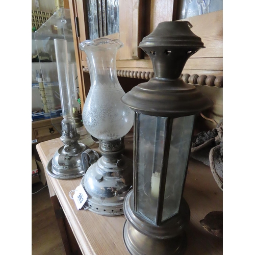 393 - Collection of Five Antique Oil and Kerosene Lamps and Candle Holder Tallest Approximately 15 Inches ... 