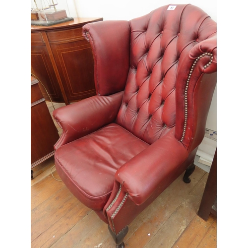 83 - Burgundy Chesterfield Wing Back Arm Chair Approximately 42 Inches Tall x 32 Wide