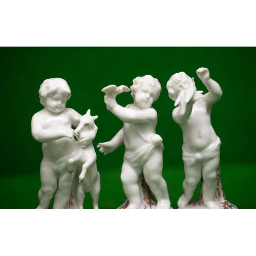 864 - Set of Three Meissen Porcelain Figures of Playful Cherubs Each Approximately 3 Inches High