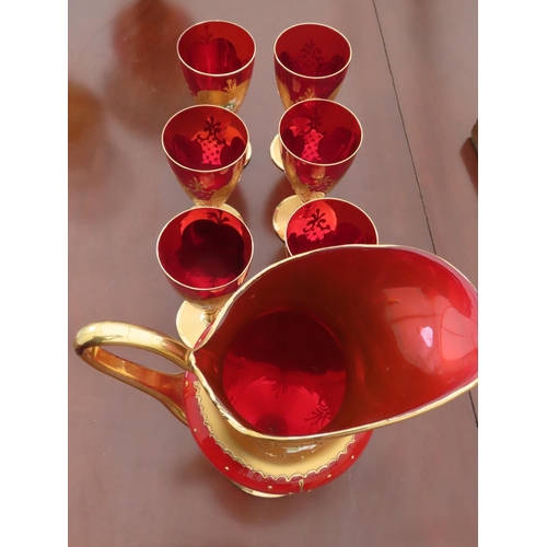 91 - Set of Six Cranberry Glass Wine Glasses with Gilt Decoration and Floral Motif Together with Matching... 