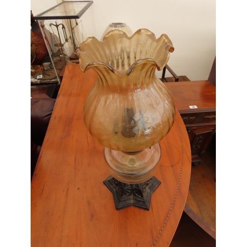 94 - Victorian Oil Lamp with Unusual Cast Iron Base Approximately 15 Inches Tall