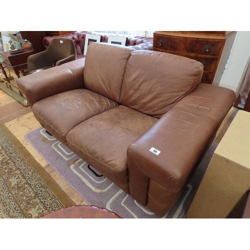 98 - Matching Tan Leather Two Seater Couch 65 Inches Wide x 30 Inches Tall