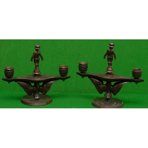 1038 - Pair of Empire Bronze Candelabra Attractively Detailed with Cherub Motif Surmounts