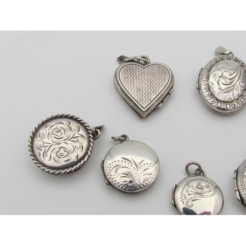 543 - Eight Solid Silver Pendants of Different Forms and Shapes All Articulated and Stamped