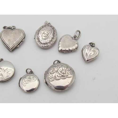 543 - Eight Solid Silver Pendants of Different Forms and Shapes All Articulated and Stamped