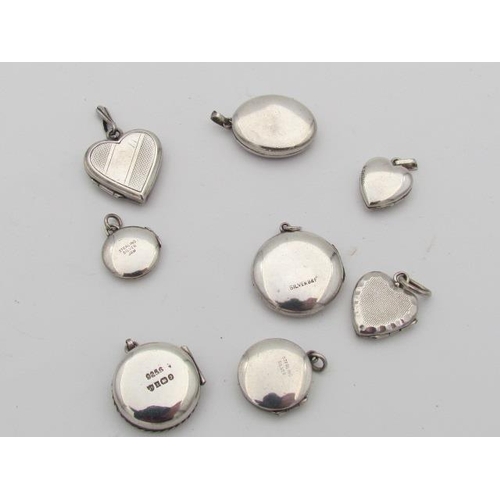 543 - Eight Solid Silver Pendants of Different Forms and Shapes All Articulated and Stamped