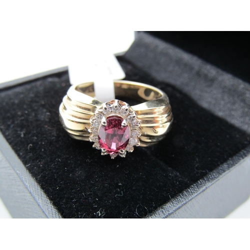 118 - Ruby and Diamond Cluster Ring Centre Stone Oval Cut Mounted on 18 Carat Yellow Gold Halo Set Ruby Ap... 