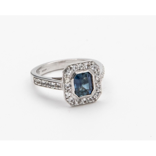 44 - 18 Carat White Sapphire and Blue Sapphire Halo Cluster Ladies Ring Central Emerald Cut Sapphire Rub ... 