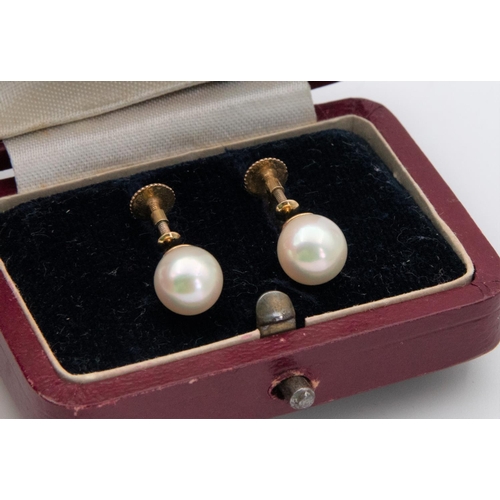 63 - Pair of Pearl Earrings Cup Set to Screw Fittings Mounted on 9 Carat Gold