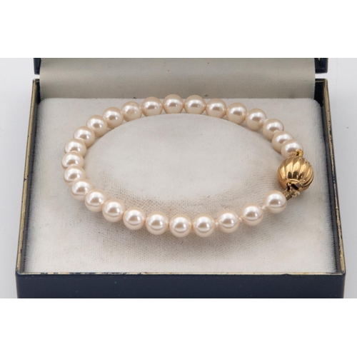 67 - Single Row Uniform Simulated Pearl Ladies Bracelet Good Condition with Gilt Metal Safety Clasp