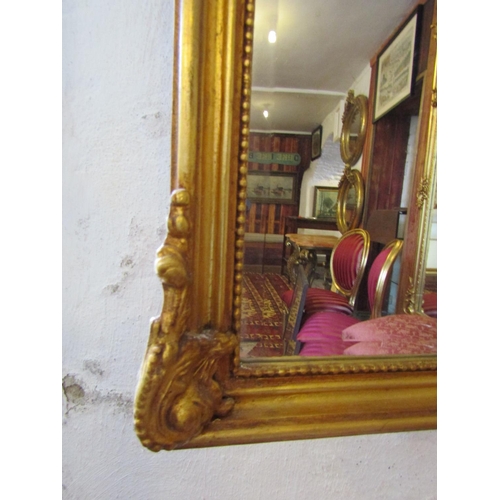 754 - Gilded Over Mantle or Wall Mirror with Upper Cartouche Decoration Approximately 4ft Wide x 5ft High