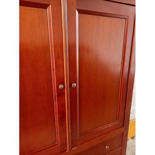 814 - Modern Mahogany Two Door Television Cabinet with Pull Out Rest above Drawers to Base Approximately 3... 