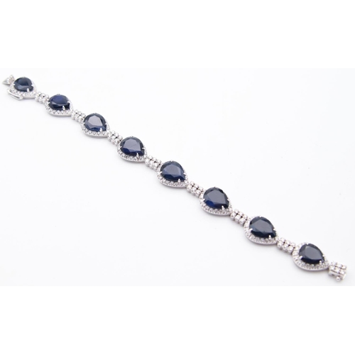 111 - Sapphire and Diamond Ladies Bracelet Mounted on 18 Carat White Gold Articulated Form Finely Detailed... 